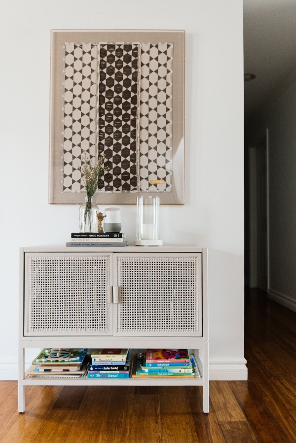 Tricks to hide your toddlers toys and books on shelves by Kimberly Lapides of eatsleepwear