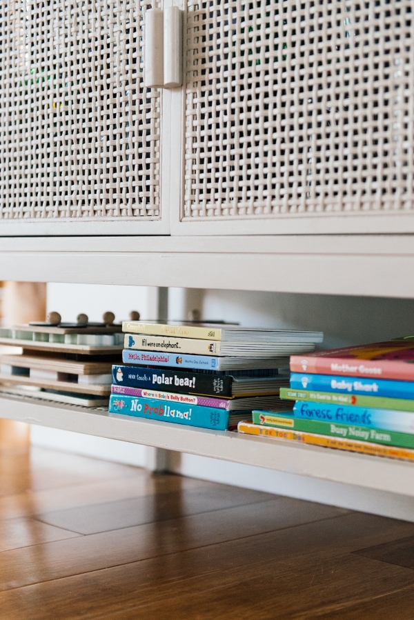 Tricks to hide your toddlers toys and books on shelves by Kimberly Lapides of eatsleepwear