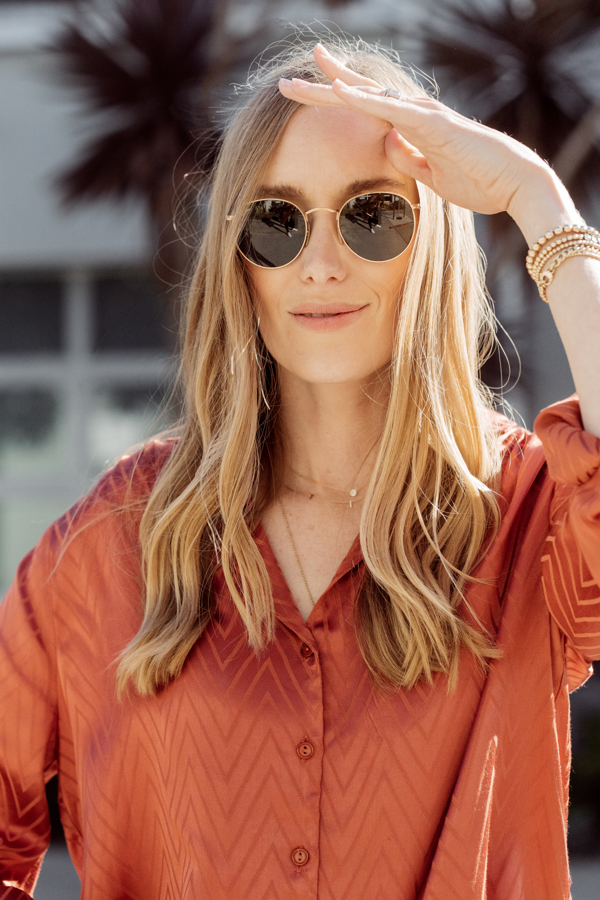 Kimberly Lapides from eatsleepwear wearing a casual mom on the go outfit wearing naked cashmere, jbrand, astr the label, golden goose and ray-ban.