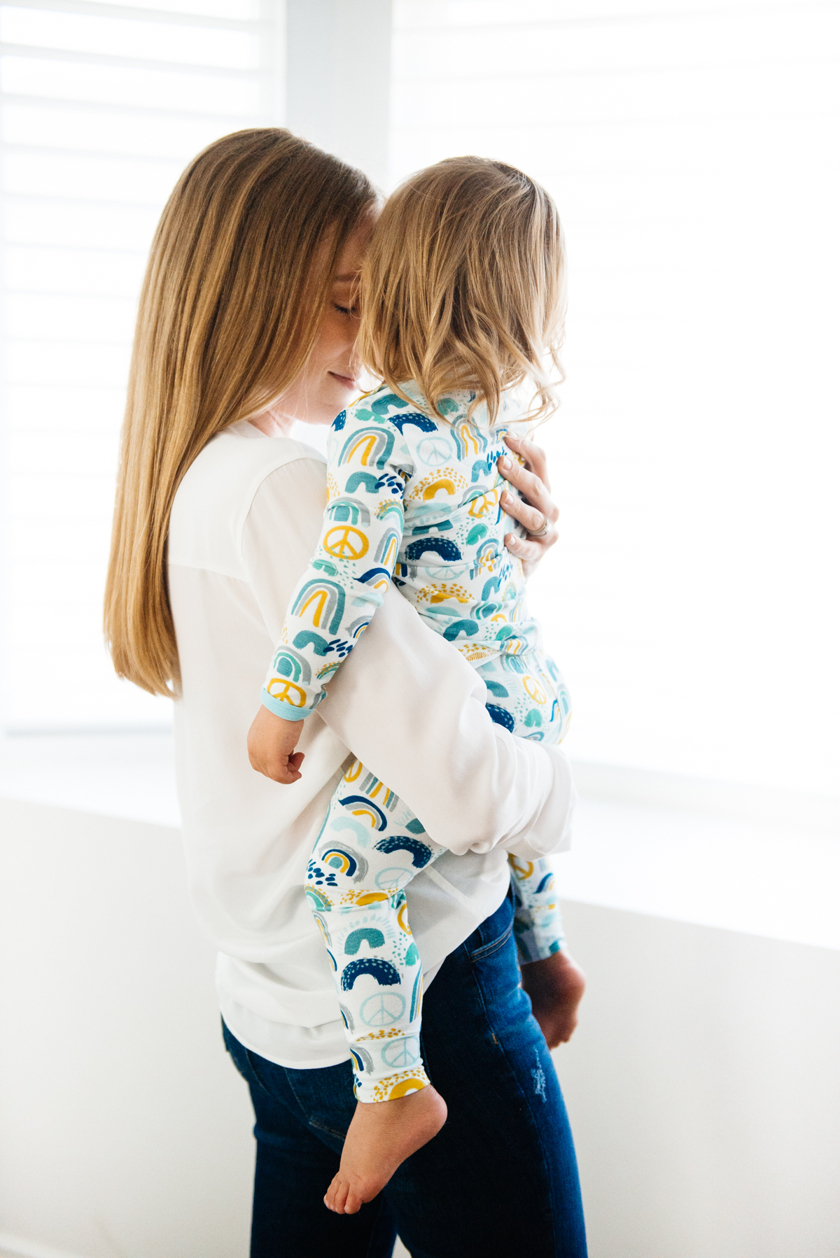 Kimberly Lapides of eatsleepwear and son in Clover Baby & Kids pajamas celebrating Rainbow Baby, IVF, and Infertility
