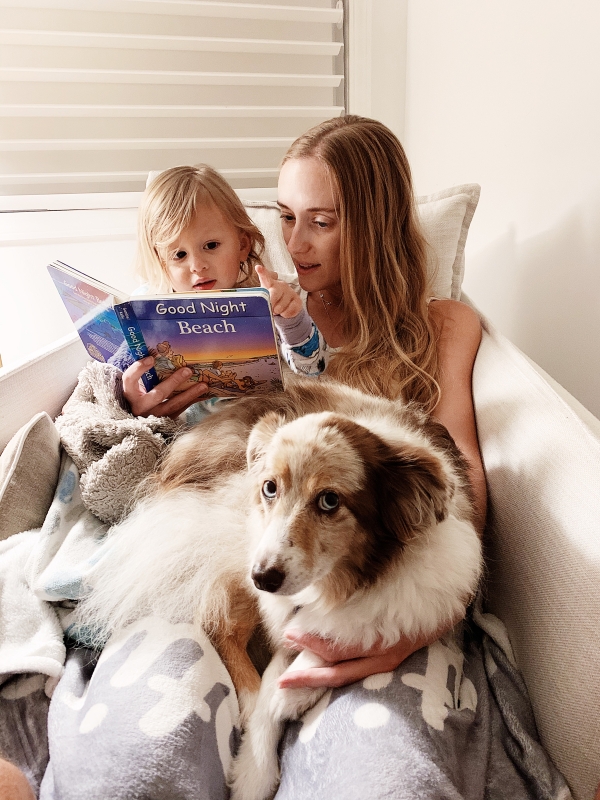 2 year old toddler bedtime routine reading a book.
