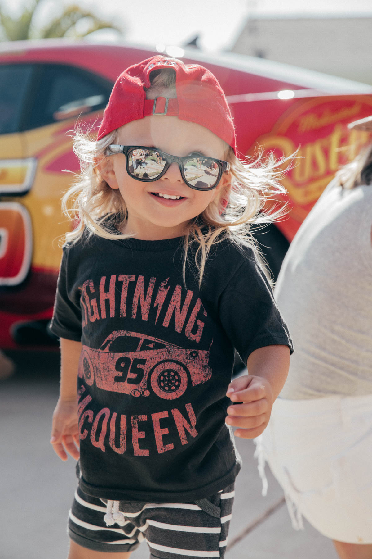Happy Toddler Dancing at Disney Pixar Cars themed birthday