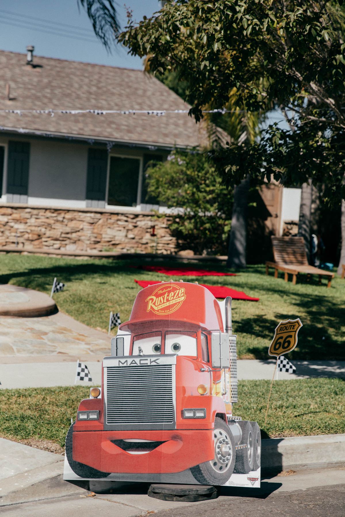 Mac cutout and party decorations at Disney Pixar Cars themed birthday