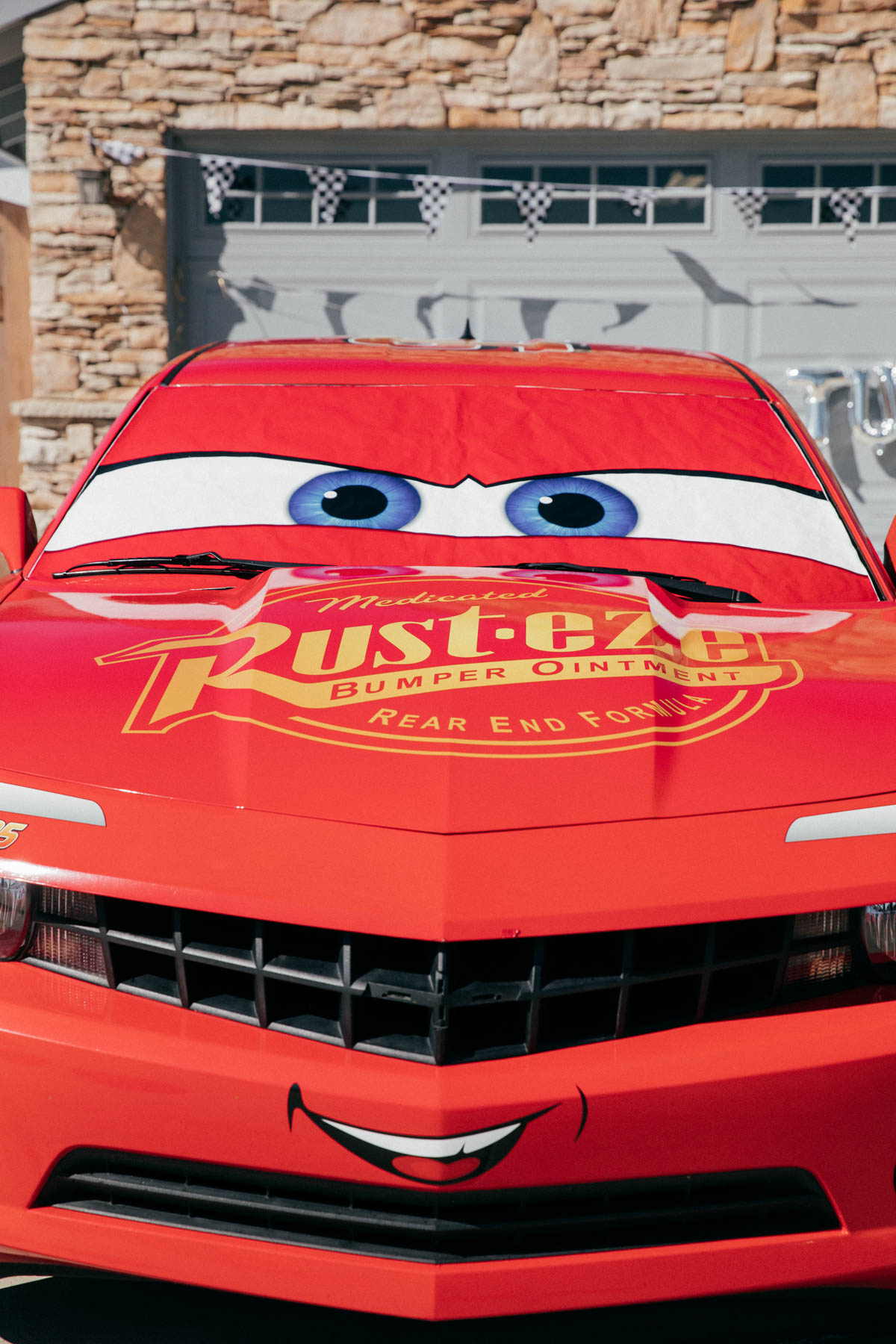Lightning McQueen Impersonator car at Disney Pixar Cars themed birthday