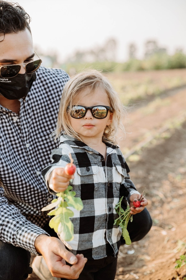 Vegetable picking at Hayride on tractor at Pumpkin Patch Photo shoot at Tanaka Farms