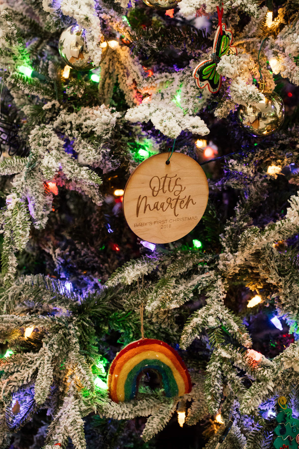 Indoor Holiday decor of lit Christmas tree and ornaments