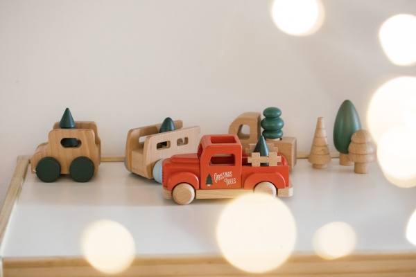 Indoor Holiday decor of kids Christmas truck toys