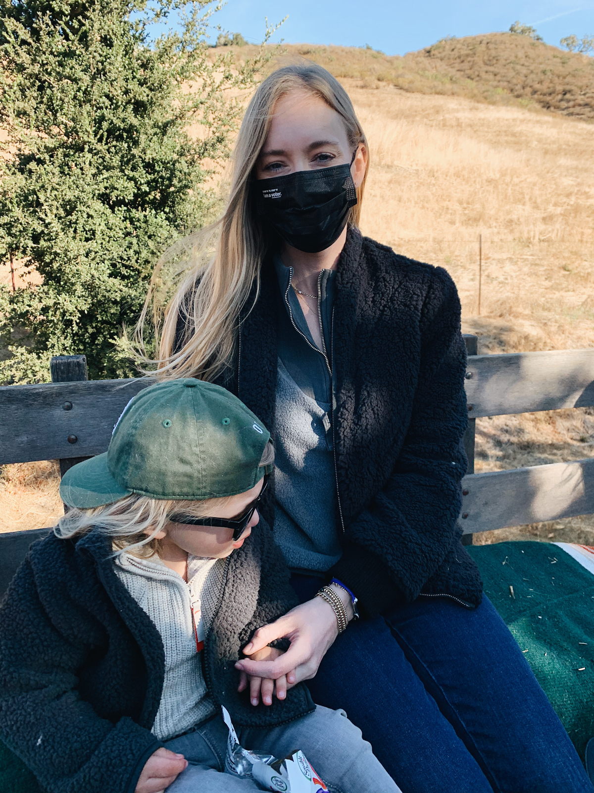 Mother and son on wagon ride to breakfast at Alisal Guest Ranch and Resort 