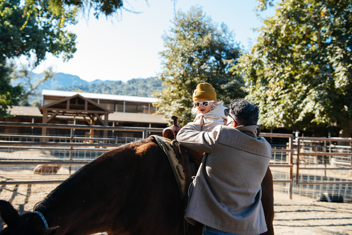 Toddler on horse at Alisal Guest Ranch and Resort 