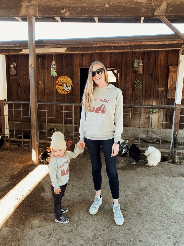 Mom and toddler in kid friendly barnyard at Alisal Guest Ranch and Resort 